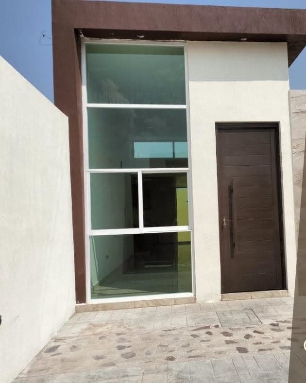 Fachada moderna de una casa en venta en Pabellón de Arteaga
